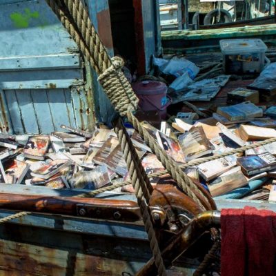 PSS shipyard left all our books out to rot on old fishing boat.