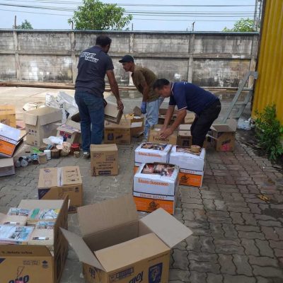 PSS shipyard stuff counting the books and locking them in a container. They never paid us for the damage nor did they return the books.